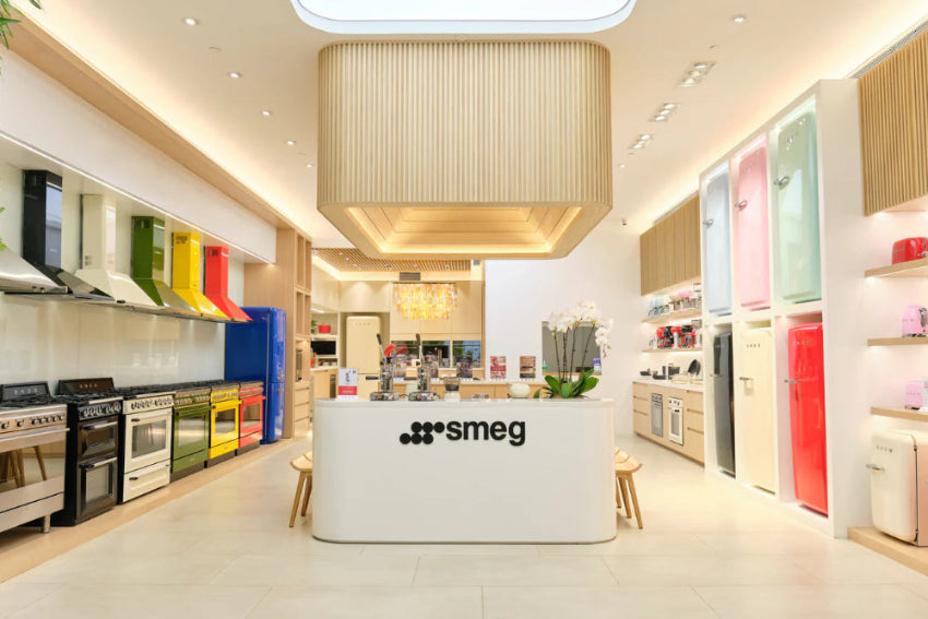 Modern kitchen showroom with SMEG appliances on display